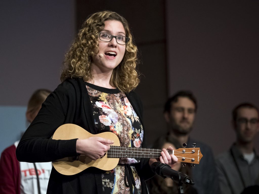 Jessamyn Fairfield playing ukulele at TEDxTUM. Photo by Wade Million.